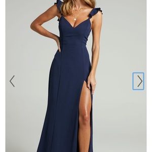 Never been worn. Tags still on. Navy blue maxi dress